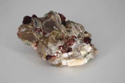 Spessartine Garnets on Quartz w/ Mica, Feldspar and Schorl