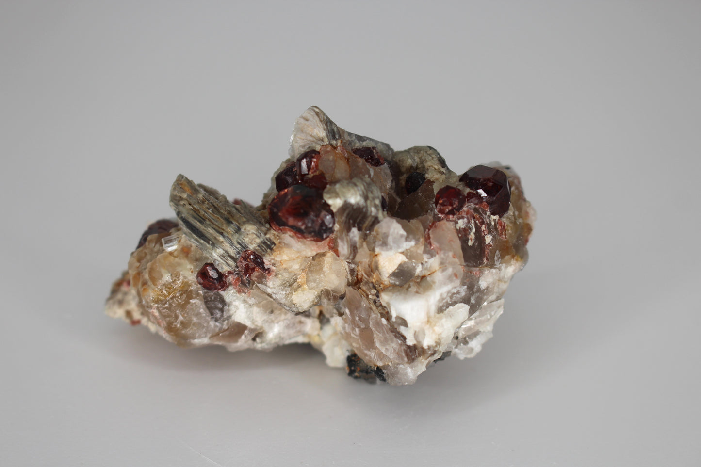 Spessartine Garnets on Quartz w/ Mica, Feldspar and Schorl