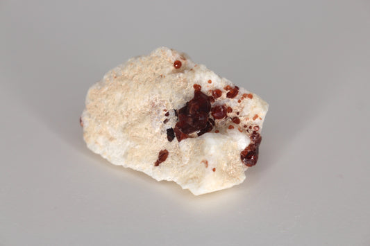 Spessartine Garnet on Feldspar