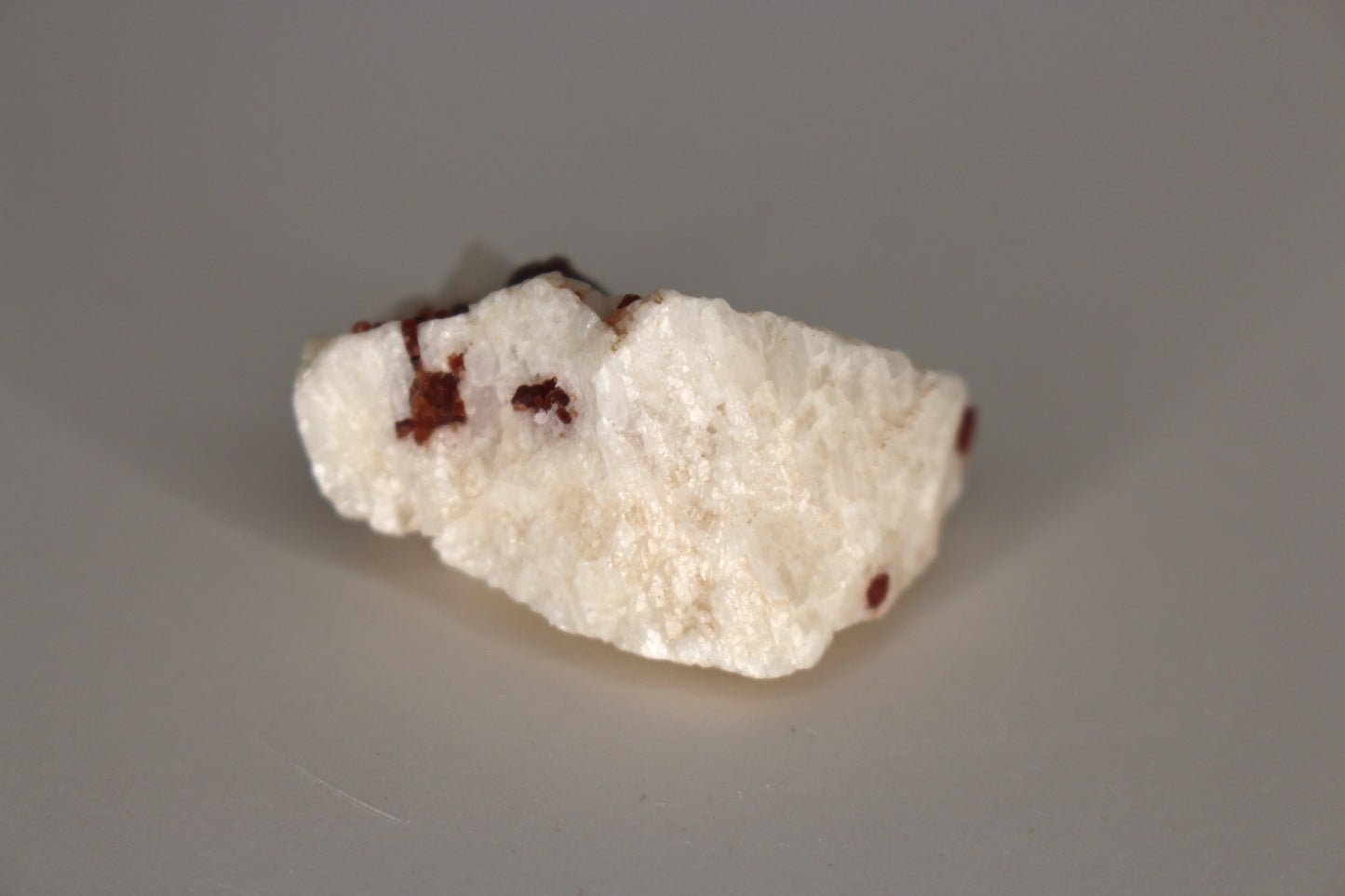 Spessartine Garnet on Feldspar