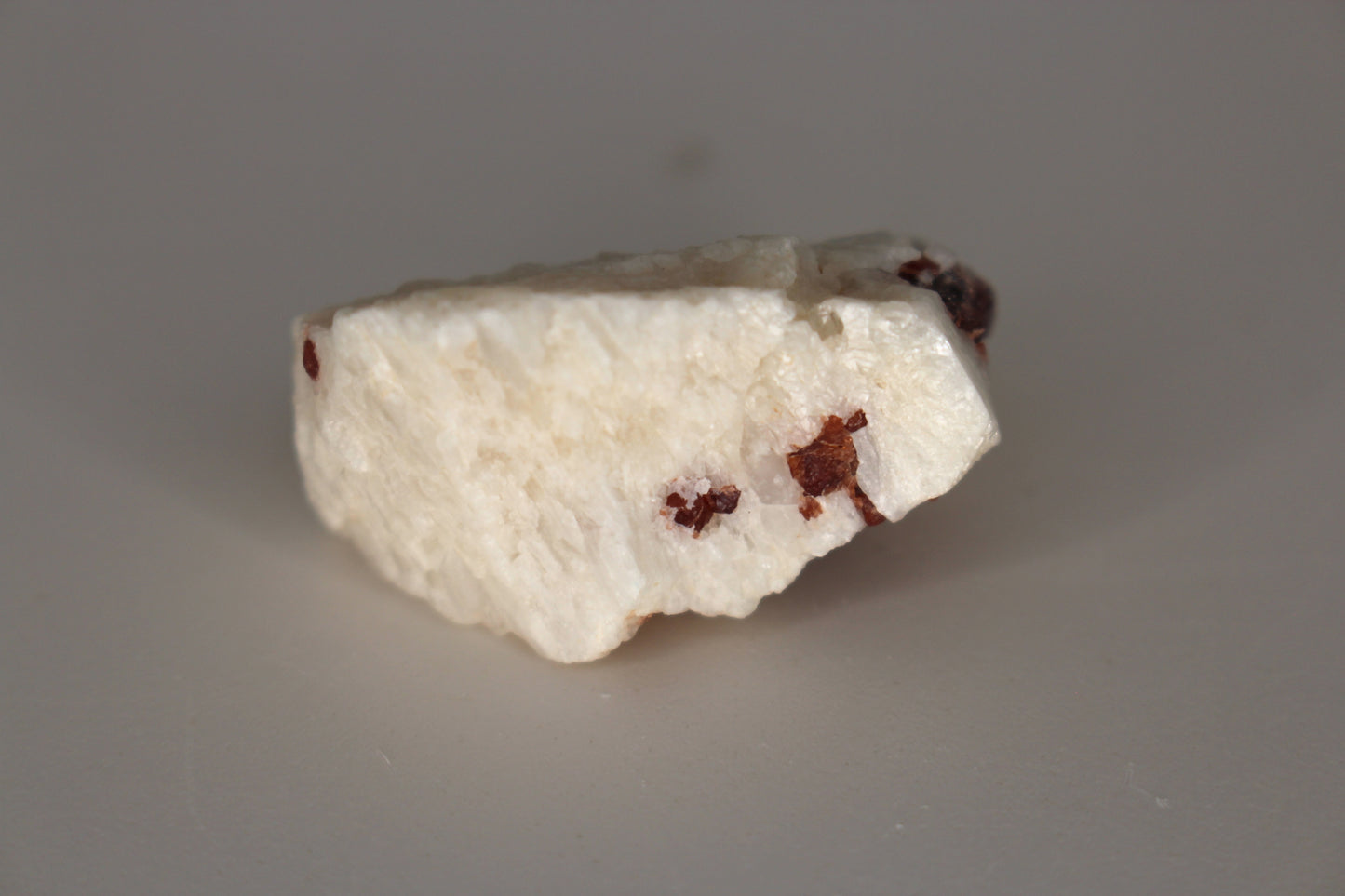 Spessartine Garnet on Feldspar